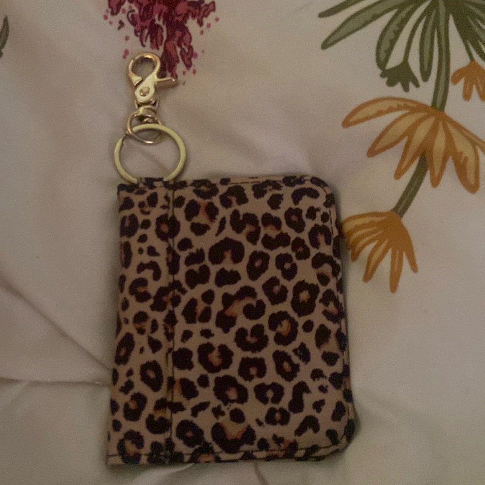Barely used small leopard print card wallet.